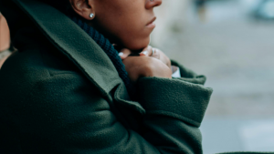 The picture shows a woman that is worried about her future.